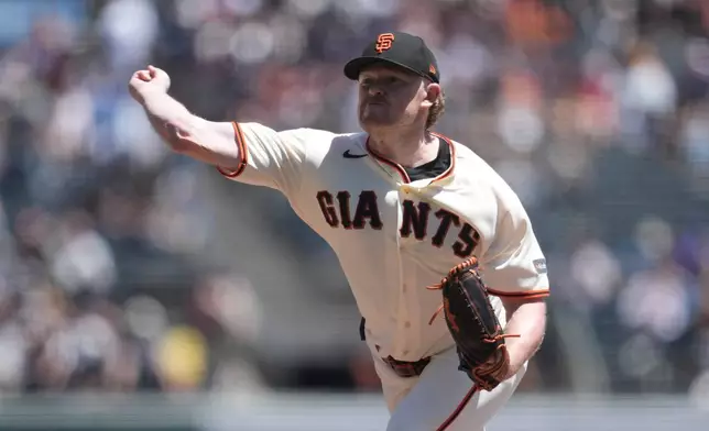 San Francisco Giants pitcher Logan Webb throws against the Milwaukee Brewers during the first inning of a baseball game, Wednesday, July 29, 2026, in San Francisco. (AP Photo/Jeff Chiu)