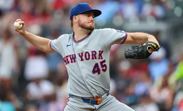 New York Mets pitcher Christian Scott delivers in the first inning of a baseball game against the Atlanta Braves, Friday, July 3, 2026, in Atlanta. (AP Photo/Colin Hubbard)