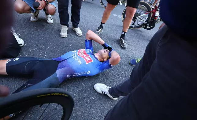 Belgium's Jasper Philipsen reacts after winning the seventeenth stage of the Tour de France cycling race, with start in Chambery and finish in Voiron France, Wednesday, July 22, 2026. (Gonzalo Fuentes/Pool Photo via AP)
