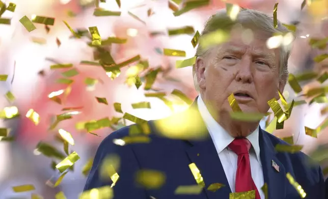 President Donald Trump is pictured as confetti falls at the conclusion of the World Cup championship final soccer match between Spain and Argentina in East Rutherford, N.J., Sunday, July 19, 2026. (AP Photo/Jacquelyn Martin)
