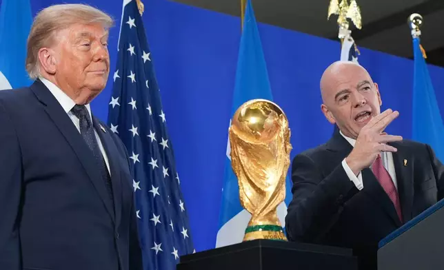 President Donald Trump listens as FIFA President Gianni Infantino speaks at a reception at Trump Tower in New York, Friday, July 17, 2026. (AP Photo/Jacquelyn Martin)