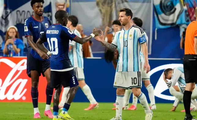 Argentina's Lionel Messi (10) greets Cape Verde's Jamiro Monteiro (10) after the World Cup round of 32 soccer match between Argentina and Cape Verde in Miami Gardens, Fla., Friday, July 3, 2026. (AP Photo/Chris Carlson)
