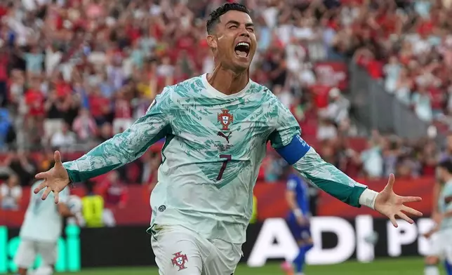 Portugal's Cristiano Ronaldo (7) celebrates after scoring their opening goal during the World Cup round of 32 soccer match between Portugal and Croatia in Toronto, Thursday, July 2, 2026. (AP Photo/Stephanie Scarbrough)
