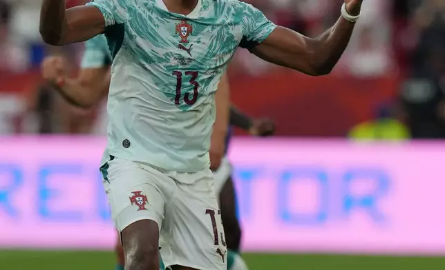 Portugal's Renato Veiga gestures during the World Cup round of 32 soccer match against Croatia in Toronto, Thursday, July 2, 2026. (AP Photo/Stephanie Scarbrough)