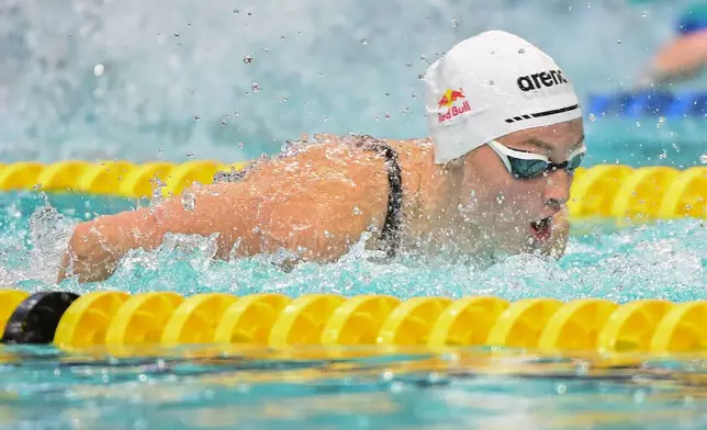 Summer McIntosh swims to a new world record during the women's 200m butterfly final at the Canadian Swimming Trials in Montreal, on Sunday, July 5, 2026. (Graham Hughes/The Canadian Press via AP)