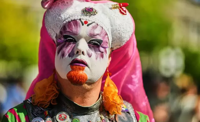 Sister Daphne of the German chapter OSPI of the Sisters of Perpetual Indulgence (SPI) attends the first Drag March on the eve of the Pride March in Berlin, Germany, Friday, July 24, 2026. (AP Photo/Markus Schreiber)