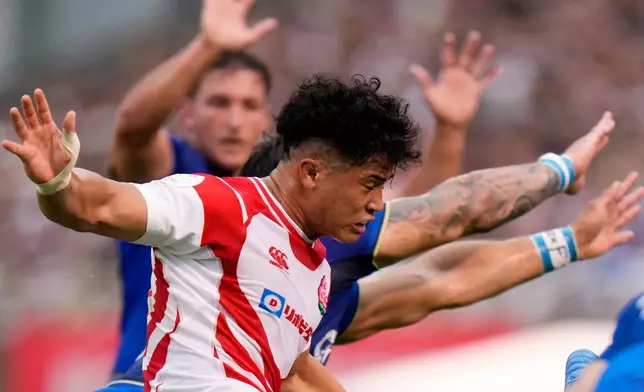 Japan's Ryunosuke Ito kicks the ball during the Nations Championship rugby match between Japan and Italy in Tokyo, Saturday, July 4, 2026. (AP Photo/Shuji Kajiyama)