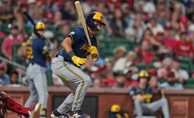 Milwaukee Brewers' David Hamilton follows through on a two-run double during the seventh inning of a baseball game against the St. Louis Cardinals Monday, July 6, 2026, in St. Louis. (AP Photo/Jeff Roberson)