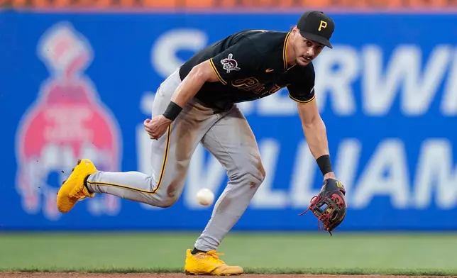 Pittsburgh Pirates shortstop Konnor Griffin cannot reach a single by Philadelphia Phillies' Gabriel Rincones Jr. during the fourth inning of a baseball game Wednesday, July 1, 2026, in Philadelphia. (AP Photo/Matt Slocum)