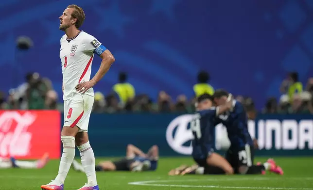 England's Harry Kane (9) reacts after the World Cup semifinal soccer match between England and Argentina in Atlanta, Wednesday, July 15, 2026. (AP Photo/Stephanie Scarbrough)