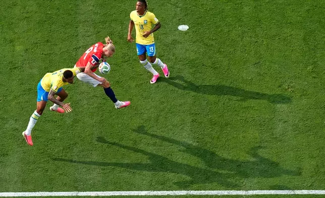 Norway's Erling Haaland (9) scores their opening goal during the World Cup round of 16 soccer match between Brazil and Norway in East Rutherford, N.J., near New York, Sunday, July 5, 2026. (AP Photo/Stephen K.H. Moyes)