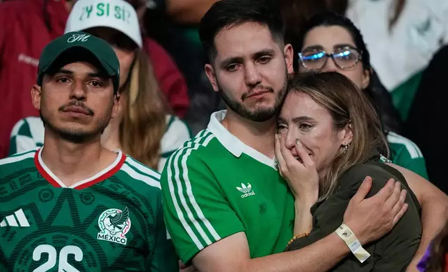 Mexico fans react following the World Cup round of 16 soccer match between Mexico and England in Mexico City, Sunday, July 5, 2026. (AP Photo/Natacha Pisarenko)