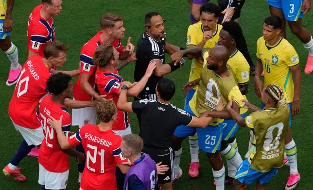 Players scuffle during the World Cup round of 16 soccer match between Brazil and Norway in East Rutherford, N.J., near New York, Sunday, July 5, 2026. (AP Photo/Yuki Iwamura)