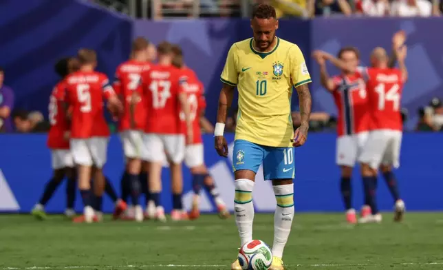 Brazil's Neymar (10) reacts after Norway's Erling Haaland (9) scored the opening goal during the World Cup round of 16 soccer match between Brazil and Norway in East Rutherford, N.J., near New York, Sunday, July 5, 2026. (AP Photo/Adam Hunger)