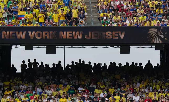 Fans watch action during the World Cup round of 16 soccer match between Brazil and Norway in East Rutherford, N.J., near New York, Sunday, July 5, 2026. (AP Photo/Frank Franklin II)