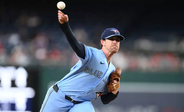 Toronto Blue Jays pitcher Shane Bieber throws during the first inning of a baseball game against the Washington Nationals, Tuesday, July 28, 2026, in Washington. (AP Photo/Nick Wass)