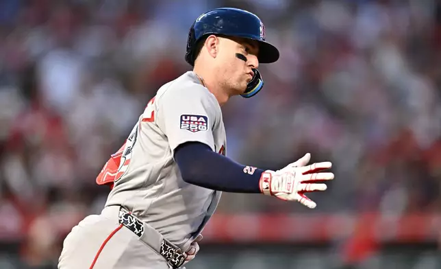 Boston Red Sox's Romy Gonzalez runs after hitting a two-run home run during the fifth inning of a baseball game against the Los Angeles Angels, Saturday, July 4, 2026, in Anaheim, Calif. (AP Photo/William Liang)