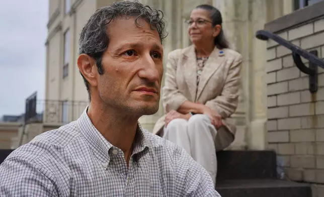 FILE - Rabbi Seth Adelson, of Congregation Beth Shalom, a Conservative synagogue located just blocks from Tree of Life in the Squirrel Hill neighborhood, sits for a portrait with Audrey Glickman, a Tree of Life member who survived the 2018 synagogue attack, Friday, Sept. 27, 2024, in Pittsburgh. (AP Photo/Jessie Wardarski, File)
