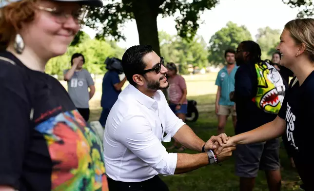 Michigan U.S. Senate candidate, Abdul El-Sayed, is seen greeting volunteers at a canvassing event at Riverside Park on Tuesday, July 7, 2026 in Grand Rapids, MI. (AP Photo/Kristen Norman)