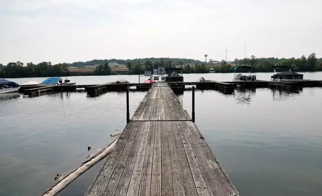 A view of the Scioto River near where multiple people died after several of them went into the water to help another person who was struggling to swim Monday, July 20, 2026, in Powell, Ohio. (AP Photo/Jay LaPrete)
