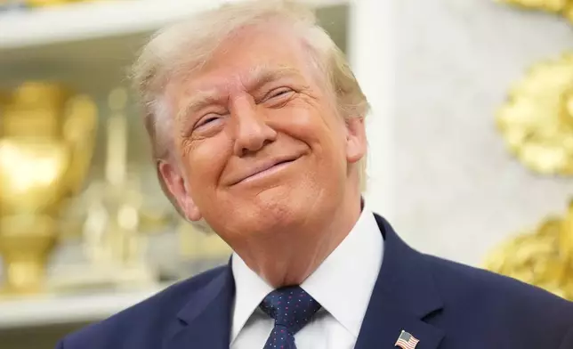 President Donald Trump smiles after ringing the opening bell for the New York Stock Exchange and the Nasdaq in the Oval Office at the White House, Monday, July 6, 2026, in Washington. (AP Photo/Mark Schiefelbein)