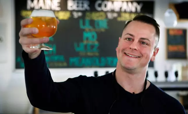 FILE - Dan Kleban, a co-owner of the Maine Beer Company, poses in the company's tasting room in Freeport, Maine, May 7, 2015. (AP Photo/Robert F. Bukaty, File)