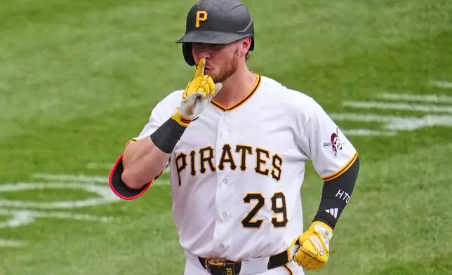 Pittsburgh Pirates' Ryan O'Hearn rounds the bases after hitting a grand slam off Chicago Cubs pitcher Jameson Taillon during the third inning of a baseball game in Pittsburgh, Sunday, July 26, 2026. (AP Photo/Gene J. Puskar)