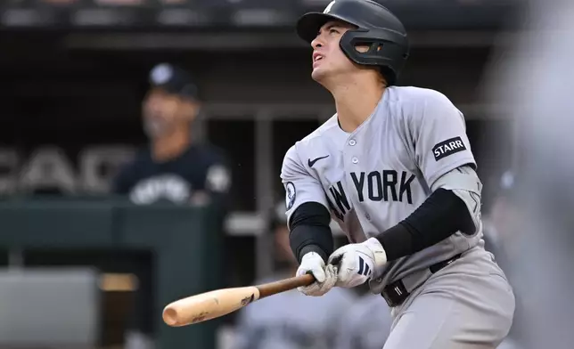 New York Yankees' Anthony Volpe watches his two-run double during the second inning of a baseball game against the Chicago White Sox in Chicago, Tuesday, July 28, 2026. (AP Photo/Paul Beaty)
