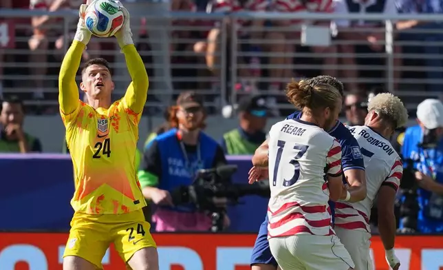 United States goalkeeper Matt Freese (24) takes the ball during the World Cup round of 32 soccer match between the United States and Bosnia in Santa Clara, Calif., near San Francisco, Wednesday, July 1, 2026. (AP Photo/Julio Cortez)