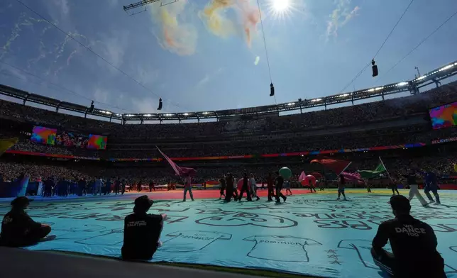 Artists perform during half time of the World Cup final soccer match between Spain and Argentina in East Rutherford, N.J., near New York, Sunday, July 19, 2026. (AP Photo/Frank Franklin II)