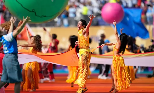 Dancers perform during the halftime show of during the World Cup final soccer match between Spain and Argentina in East Rutherford, N.J., near New York, Sunday, July 19, 2026. (AP Photo/Ashley Landis)