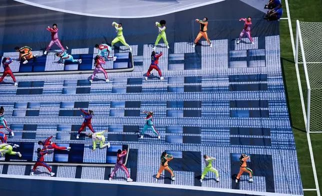 Dancers perform during the pregame closing ceremony at the World Cup final soccer match between Spain and Argentina in East Rutherford, N.J., near New York, Sunday, July 19, 2026. (AP Photo/Matt Slocum)