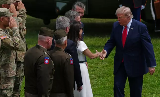 President Donald Trump greets Dina Powell McCormick, as he arrives at the United States Army War College in Carlisle, Pa., for the Pennsylvania Defense and Innovation Summit, Wednesday, July 15, 2026. (AP Photo/Julia Demaree Nikhinson)