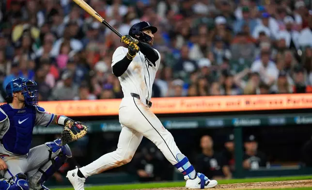 Detroit Tigers' James Outman hits a three-run home run against the Kansas City Royals during the seventh inning of a baseball game Thursday, July 23, 2026, in Detroit. (AP Photo/Paul Sancya)