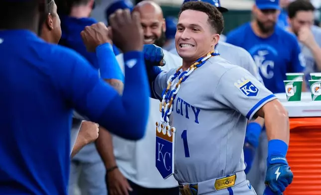 Kansas City Royals' Isaac Collins (1) celebrates his two-run home run against the Detroit Tigers during the sixth inning of a baseball game Thursday, July 23, 2026, in Detroit. (AP Photo/Paul Sancya)