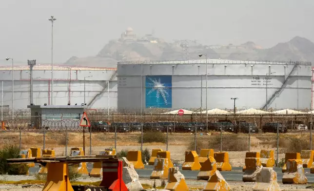 FILE - Storage tanks are seen at the North Jiddah bulk plant, an Aramco oil facility, in Jiddah, Saudi Arabia, on March 21, 2021. (AP Photo/Amr Nabil, File)