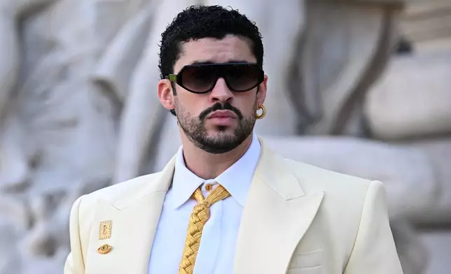 Bad Bunny arrives for the Schiaparelli Haute Couture Fall/Winter 2026-2027 Women's collection presented in Paris, Monday, July 6, 2026. (AP Photo/Emma Da Silva)