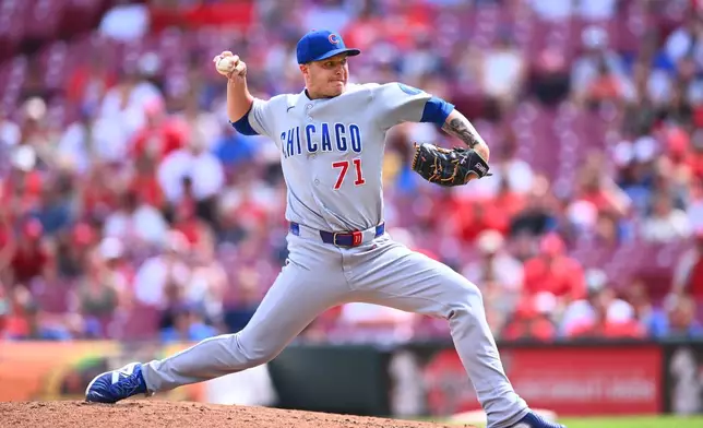 Chicago Cubs pitcher Jacob Webb throws during the ninth inning of a baseball game against the Cincinnati Reds in Cincinnati, Sunday, July 12, 2026. (AP Photo/Ben Jackson)