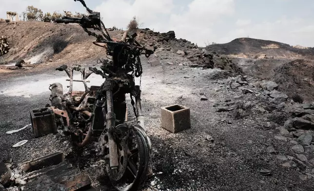 A view of a burnt area affected by wildfires in Bedar, near Almeria, Spain, Saturday, July 11, 2026. (AP Photo/Gregorio Marrero)