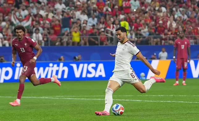 Spain's Mikel Merino (6) scores their first goal during the World Cup round of 16 soccer match between Portugal and Spain in Arlington, Texas, near Dallas, Monday, July 6, 2026. (AP Photo/Julio Cortez)
