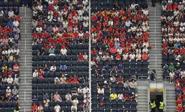 Fans watch the World Cup semifinal soccer match between France and Spain in Arlington, Texas, near Dallas, Tuesday, July 14, 2026. (AP Photo/Sam Hodde)