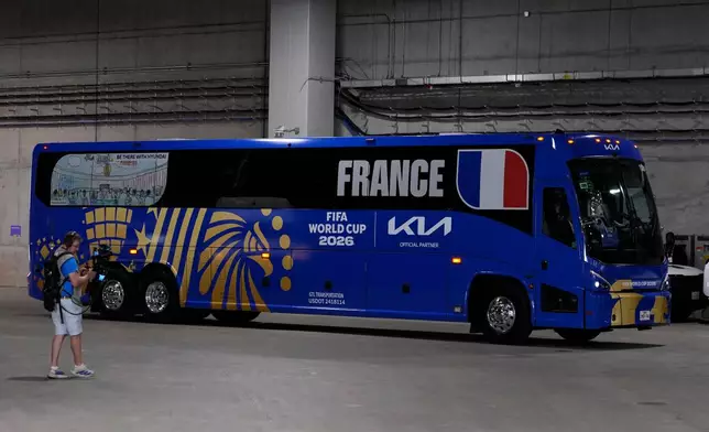 France team arrive at the stadium before the World Cup semifinal soccer match between France and Spain in Arlington, Texas, near Dallas, Tuesday, July 14, 2026. (AP Photo/Tony Gutierrez)