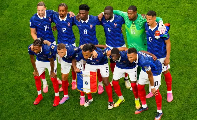 Players of France pose for the group photo prior to the World Cup semifinal soccer match between France and Spain in Arlington, Texas, near Dallas, Tuesday, July 14, 2026. (AP Photo/David J. Phillip)