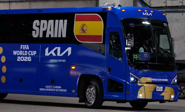 Spain team arrive at the stadium before the World Cup semifinal soccer match between France and Spain in Arlington, Texas, near Dallas, Tuesday, July 14, 2026. (AP Photo/Tony Gutierrez)