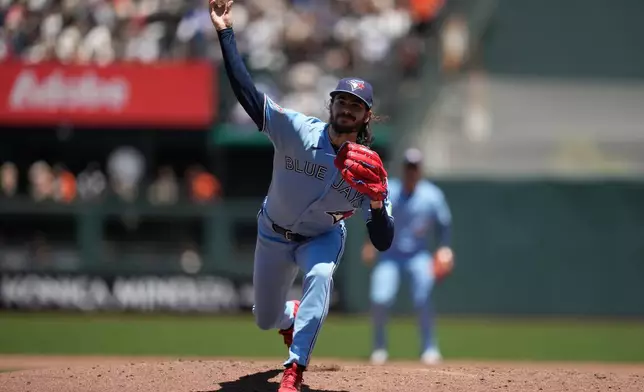 Toronto Blue Jays pitcher Dylan Cease throws against the San Francisco Giants during the fifth inning of a baseball game Wednesday, July 8, 2026, in San Francisco. (AP Photo/Jeff Chiu)