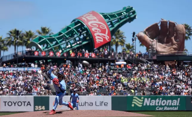 Toronto Blue Jays pitcher Dylan Cease throws against the San Francisco Giants during the fourth inning of a baseball game Wednesday, July 8, 2026, in San Francisco. (AP Photo/Jeff Chiu)