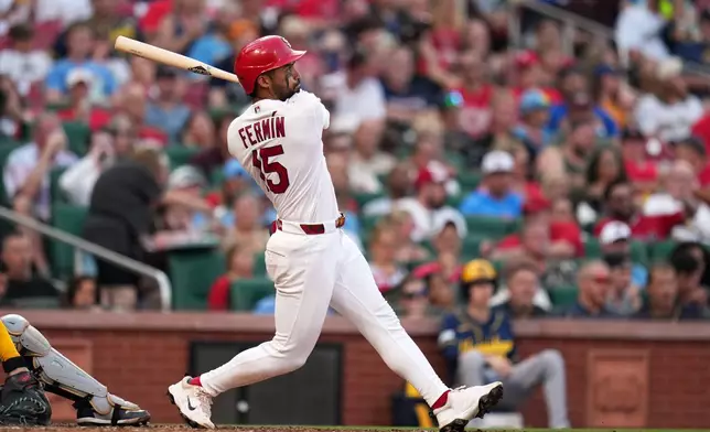St. Louis Cardinals' José Fermín watches his solo home run during the fourth inning of a baseball game against the Milwaukee Brewers Wednesday, July 8, 2026, in St. Louis. (AP Photo/Jeff Roberson)