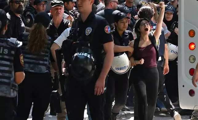 Police detain protestors during a demonstration outside of the NATO summit in Ankara, Turkey, Tuesday, July 7, 2026. (AP Photo/Ali Unal)