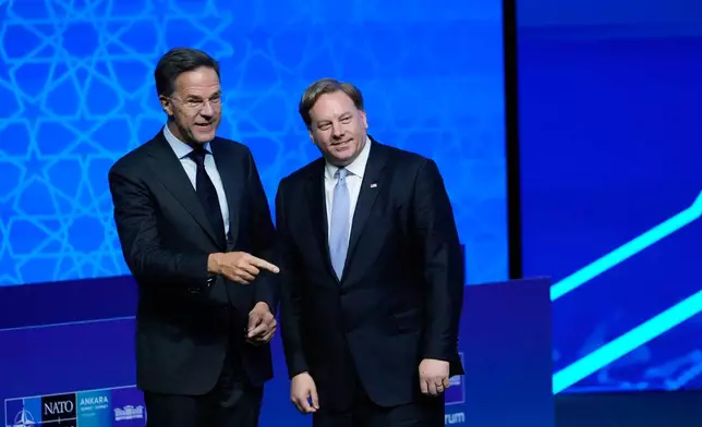 NATO Secretary General Mark Rutte, left, speaks with U.S. Under Secretary of Defense for Acquisition and Sustainment Michael Duffey during the NATO Defense Industry Forum at the NATO summit in Ankara, Turkey, Tuesday, July 7, 2026. (AP Photo/Hussein Malla)