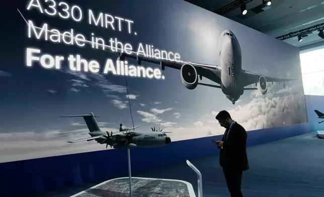 Participants view displays during the NATO Defense Industry Forum at the NATO summit in Ankara, Turkey, Tuesday, July 7, 2026. (AP Photo/Hussein Malla)